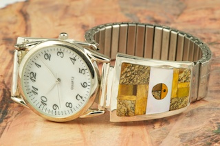 Genuine Picture Jasper and Mother of Pearl inlaid in Sterling Silver.  Mens quartz watch with expandable band. Designed by Navajo Artist Calvin Begay. Signed.